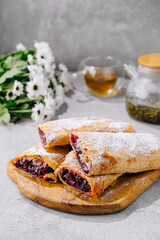 flaky puff pastries, filled with sweet cherry filling