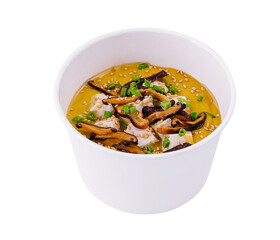 Pumpkin soup with mushrooms, sour cream and herbs and mozzarella
