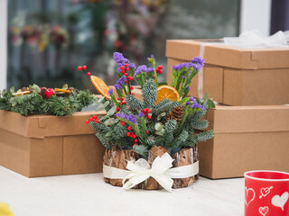 Christmas decoration with gift box and flower on white table stock photo