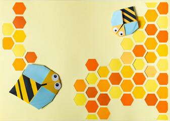 Honeycomb with two origami bees. Handmade, Paper craft.