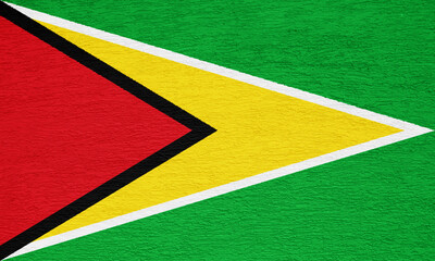 Flag of Co-operative Republic of Guyana on a textured background. Concept collage.