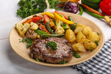 Roasted beef steak with potato