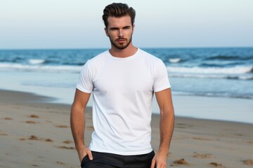 Fototapeta na wymiar White blank t shirt mock up. Men beach background