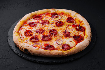pizza with sausage and red onion