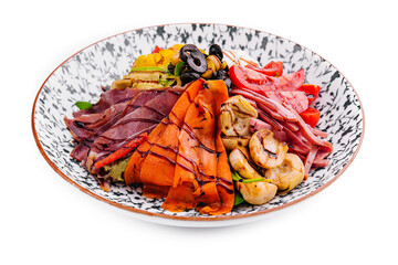 salad of various meats with mushrooms, carrots and lettuce leaves
