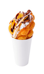 hong kong or bubble waffle with whipped cream, chocolate and bananas