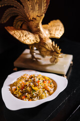 italian risotto with shrimps on white plate