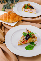 Quiche Lorraine on White Plates