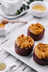 Coffee cakes with caramel and chocolate and honey