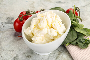 Soft cream cheese in the bowl