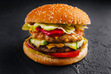 burger with two cutlets and fresh vegetables