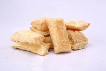 Indian famous Puff Pastry Snack, eat with hot tea or coffee on white surface. High Resolution