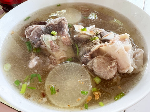 Pork Bone in Clear Soup popular Stock topped with celery cutlet .