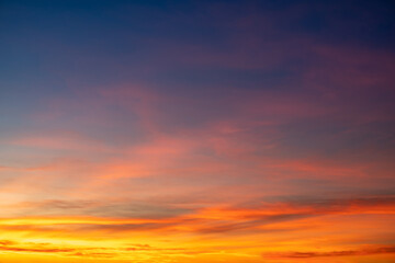 Beautiful of luxury soft gradient orange gold clouds and sunlight on the blue sky perfect for the...