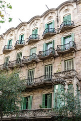 Fototapeta na wymiar Facade of old apartment buildings in el Eixample, Barcelona, Catalonia, Spain, Europe