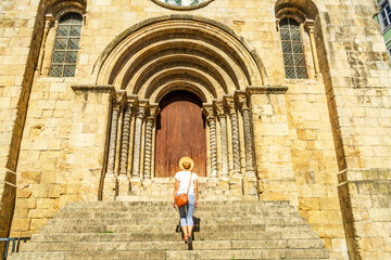 Woman visiting a church, Coimbra, Igreja de Sao Tiago