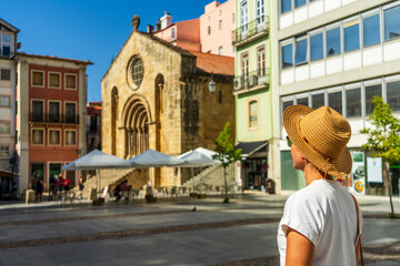 Woman sightseeing beautiful town, Coimbra, Portugal