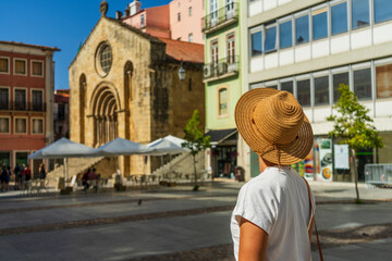 Woman sightseeing beautiful town, Coimbra, Portugal