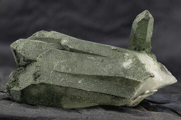 Prasio Quartz Close-Up on Dark Background, Highlighting its Unique Green Hue