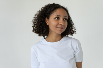 Black woman smiling with afro hair wear classic outfit isolated on gray background