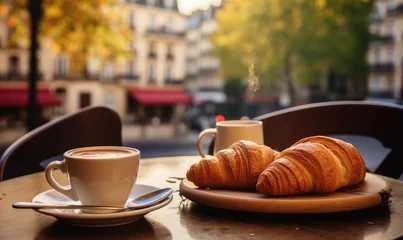 Fotobehang petit déjeuner parisien typique avec croissant et café sur une table de bistrot   © Fox_Dsign