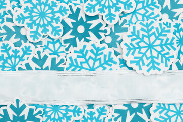 Lots of blue snowflakes with a banner winter background