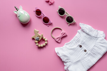 Obraz na płótnie Canvas Kids wear flat lay - dress for baby girl with accessories, top view