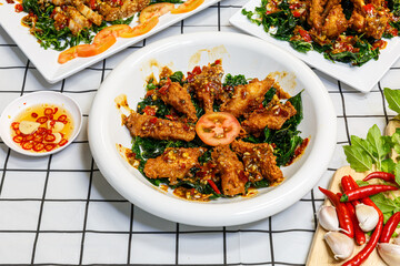 Fried chicken wings with Thai basil sauce