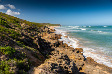rocky coastline and cliffs above the beach in Stillbay