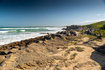 rocky coastline and cliffs above the beach in Stillbay