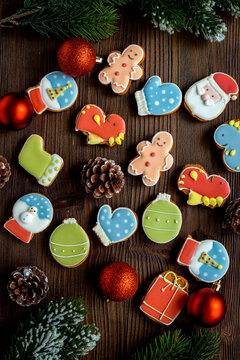 Pattern of Christmas cookies in the shape of a dragons and Santa. New Years decoration background