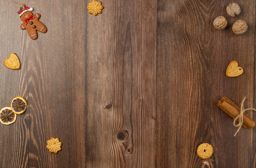 Christmas wood background with cookies and nuts