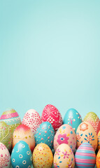 Fototapeta na wymiar A bright vertical Easter card with eggs on the bottom on bright coloured backdrop.