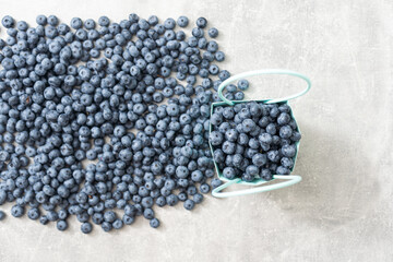 large blueberries in a green market basket
