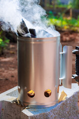 In charcoal chimney starter is used to get charcoal ready for grilling