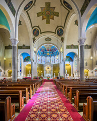 Interior nave and sanctuary of the historic St Benedict Catholic Church in downtown Terre Haute,...