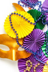 Mardi gras.Holidays mardi gras masquarade, venetian mask fan over purple background. view...