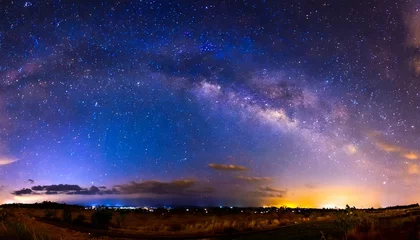 Deurstickers panorama blue night sky milky way and star on dark background universe filled nebula and galaxy with noise and grain photo by long exposure and select white balance dark night sky © Mary