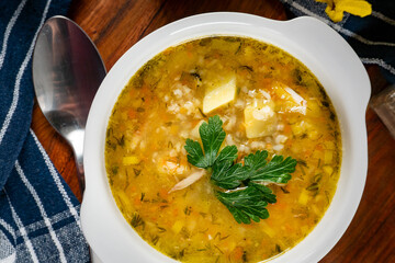 Barley soup with vegetables and chicken.