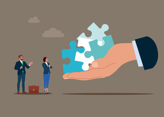 Big hand showing puzzles. Team metaphor and teamwork concept. Connecting puzzle elements. Vector illustration