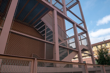 school building with fire and anti-seismic staircase, emergency exits, in steel, modern school...