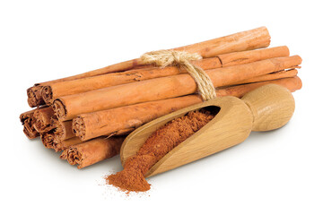Cinnamon sticks with powder in wooden scoop isolated on white background with full depth of field