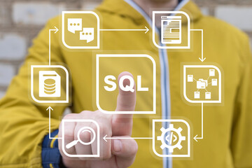 Man using virtual touch screen presses abbreviation: SQL. SQL ( Structured Query Language ) code to query data from a database and server. Learn SQL programming language, computer courses, training.