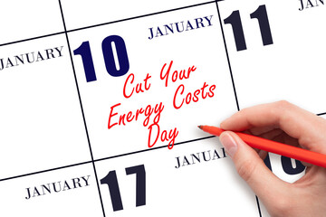 January 10. Hand writing text Cut Your Energy Costs Day on calendar date. Save the date.