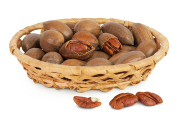 pecan nut in a wicker basket isolated on white background with full depth of field