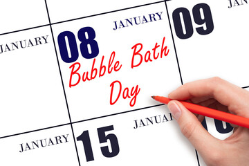 January 8. Hand writing text Bubble Bath Day on calendar date. Save the date.
