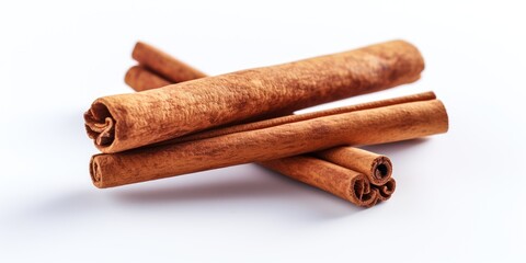 Cinnamon sticks on a bright white background