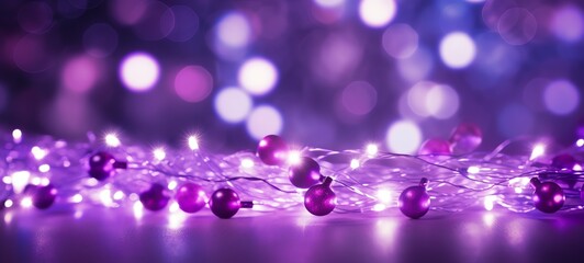 Christmas holiday decoration and illumination concept. Garland bokeh lights over purple background.
