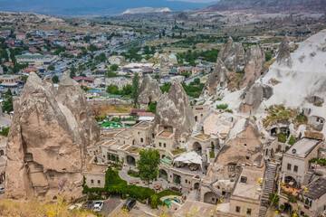 Fototapeta premium Rocky landscape in Cappadocia, Turkey. Travel in Cappadocia. Amazing landscape view of Goreme town in Cappadocia Turkey