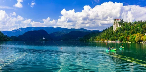 Gordijnen One of the most beautiful lakes of Europe - lake Bled in Slovenia. panoramic view with island and the castle © Freesurf